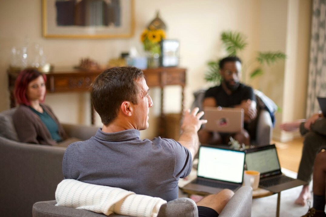 person speaking in meeting
