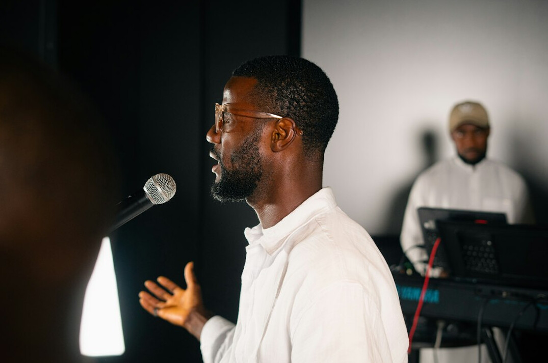 confident person speaking on stage
